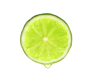 Photo of Slice of lime with dripping essential oil isolated on white