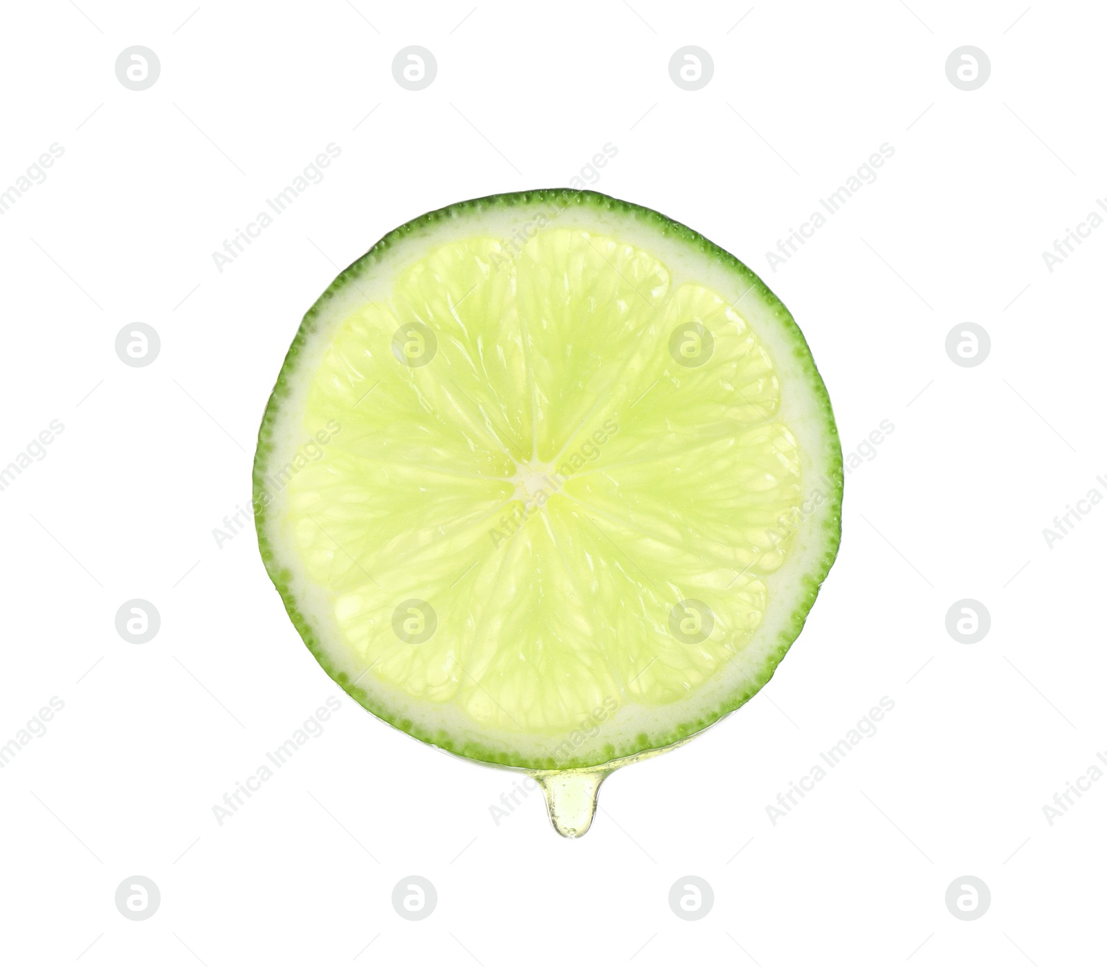 Photo of Slice of lime with dripping essential oil isolated on white