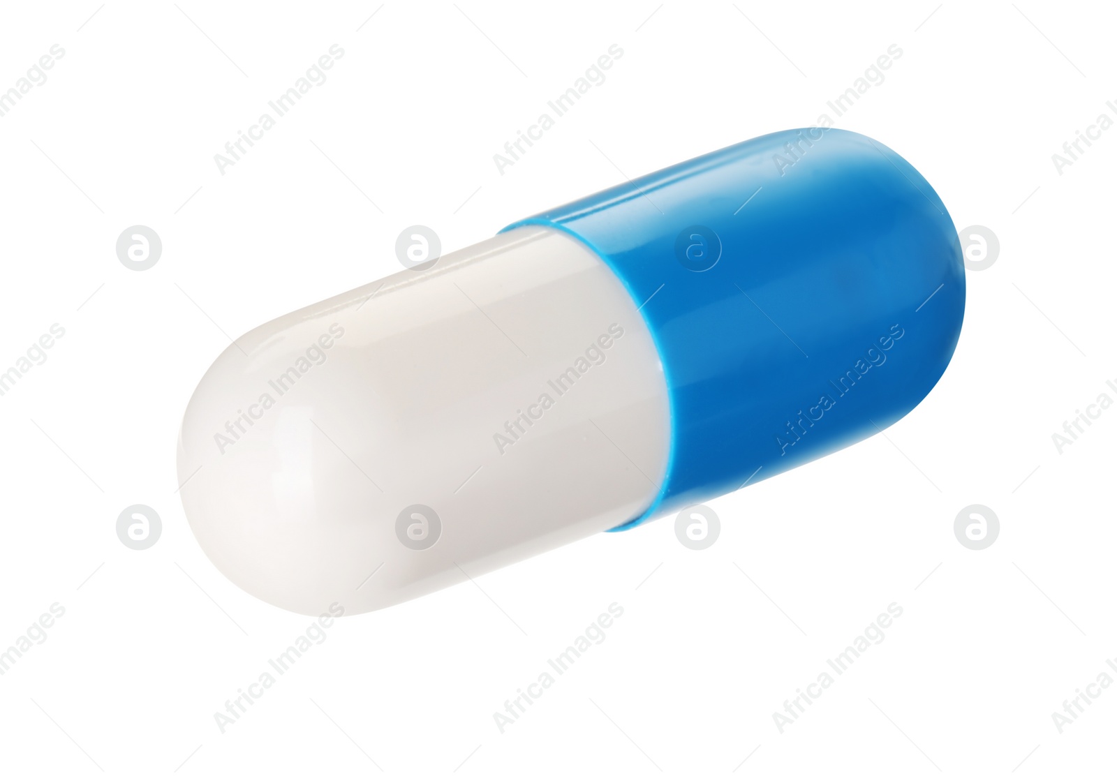 Photo of One antibiotic pill isolated on white. Medicinal treatment