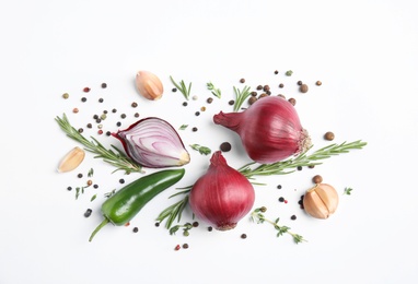 Photo of Beautiful composition with ripe red onions on white background