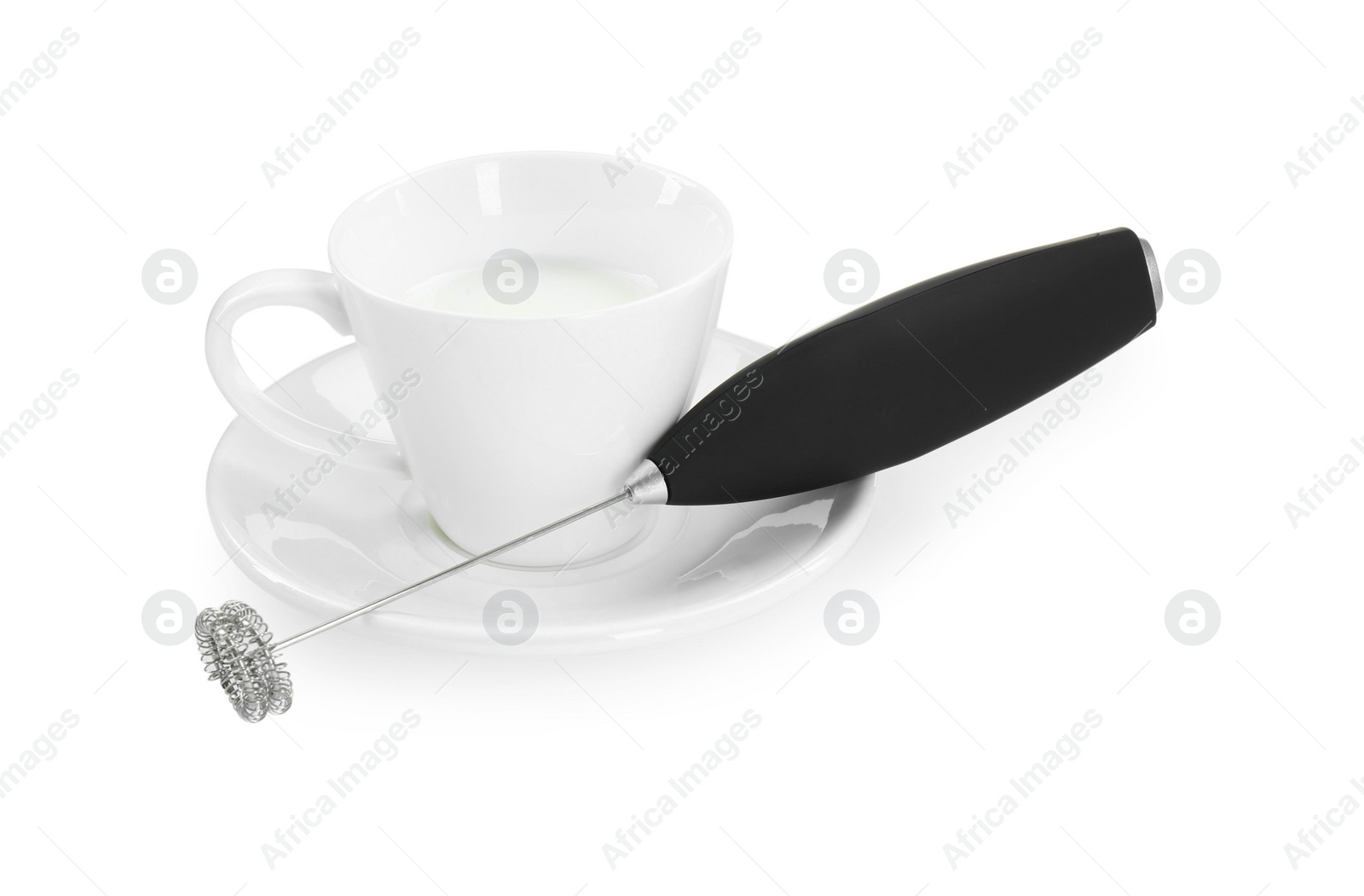 Photo of Milk frother wand and cup isolated on white