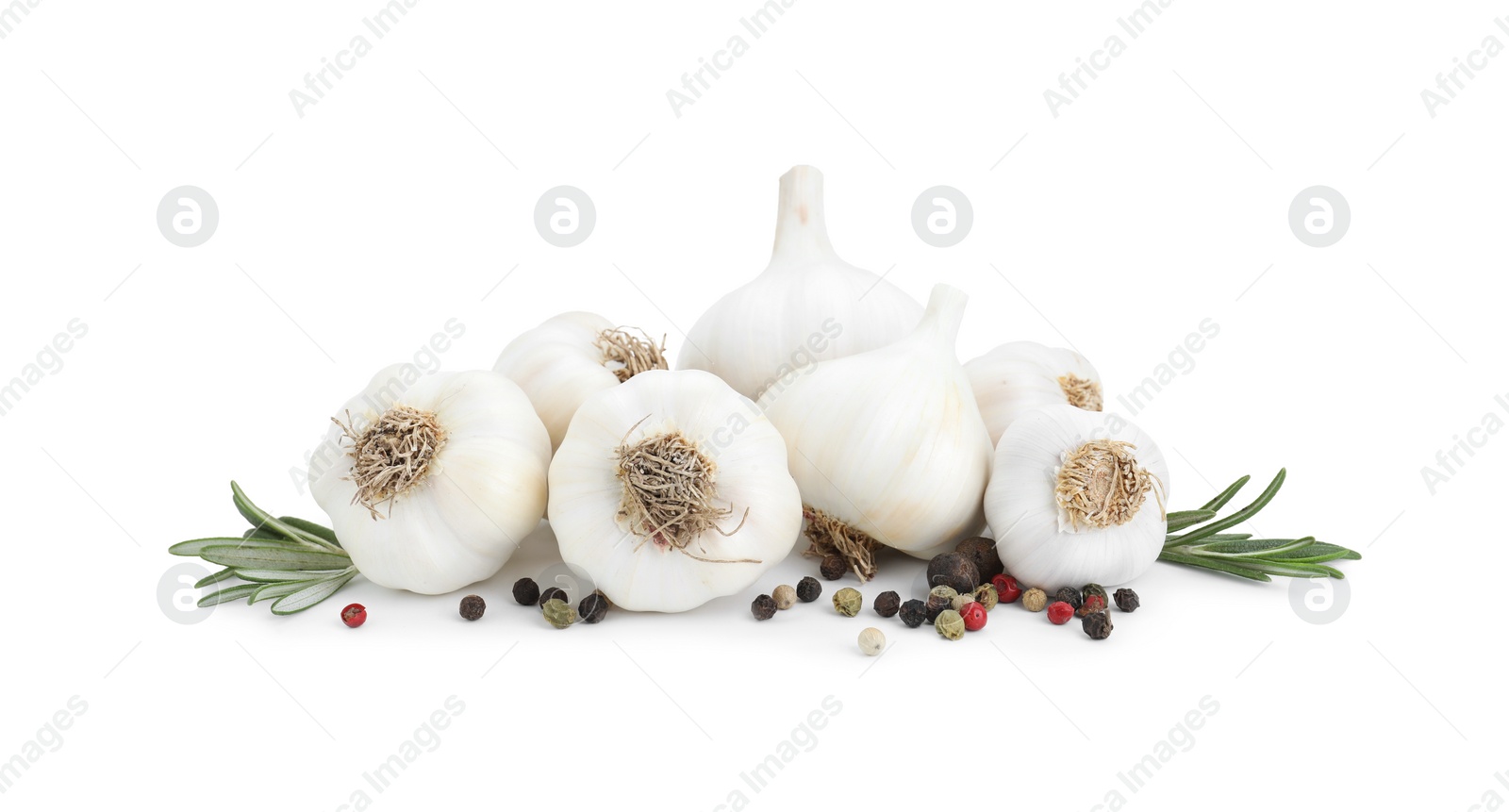 Photo of Fresh garlic bulbs, peppercorns and rosemary isolated on white