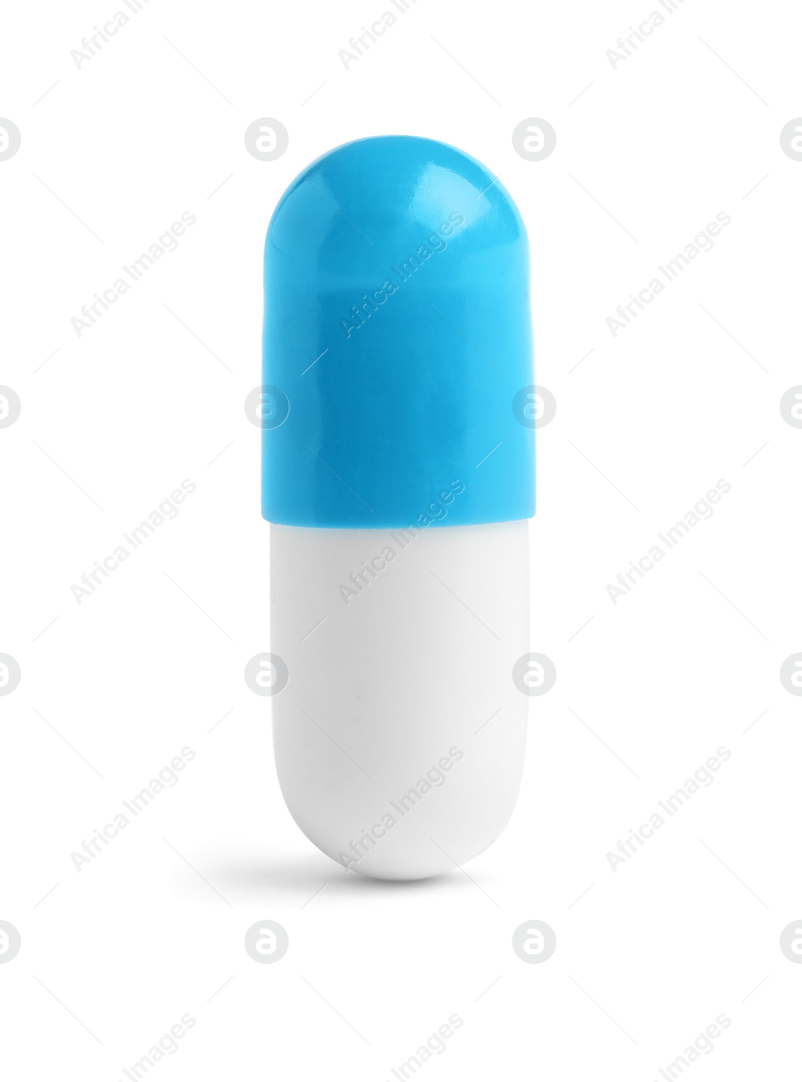 Photo of One pill on white background. Medicinal treatment