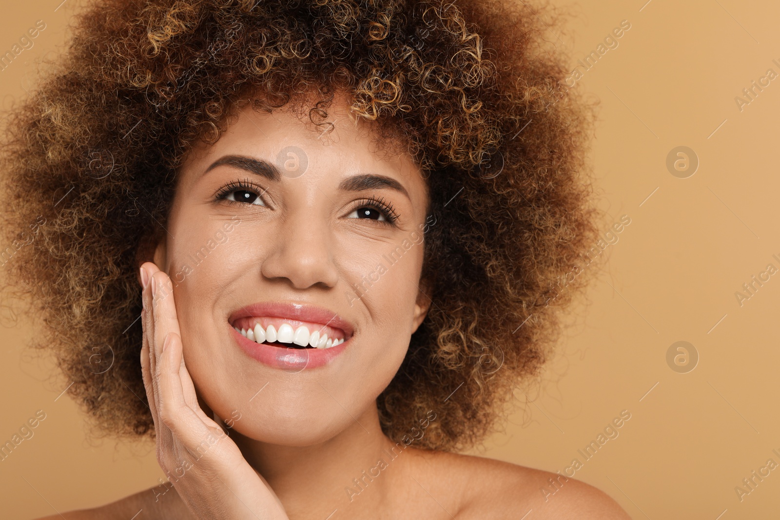 Photo of Beautiful woman with healthy skin on beige background