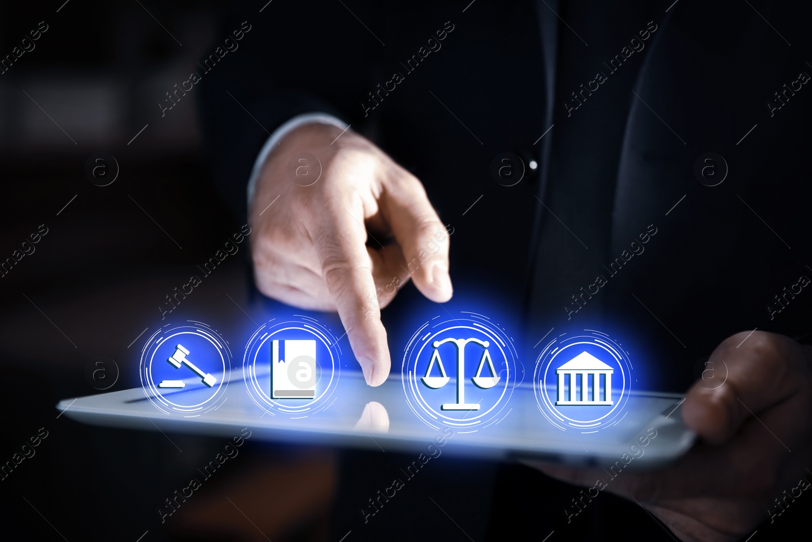 Image of Laws, legal information and online consultation. Man using tablet, closeup. Icons over device