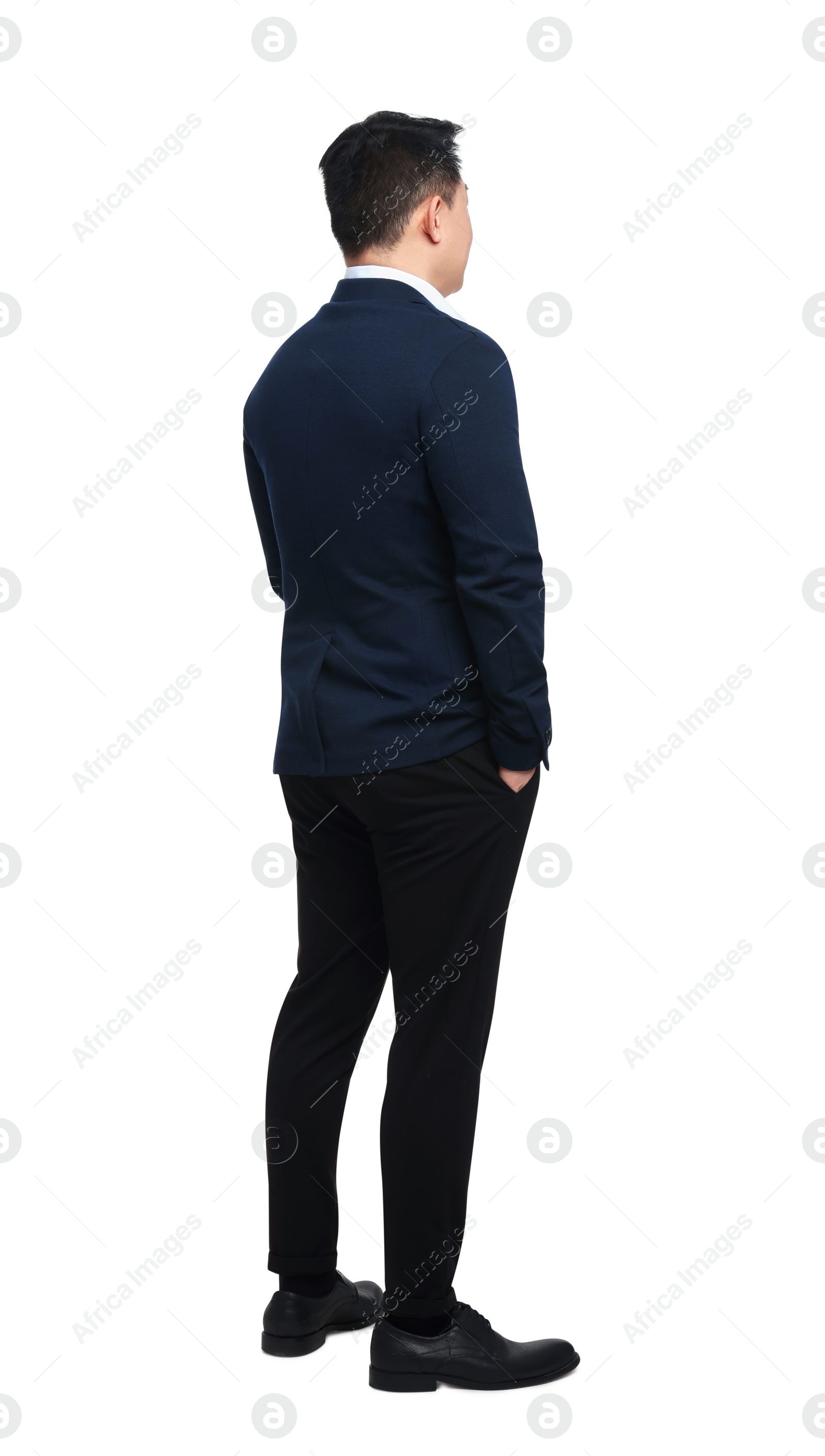 Photo of Businessman in suit posing on white background, back view