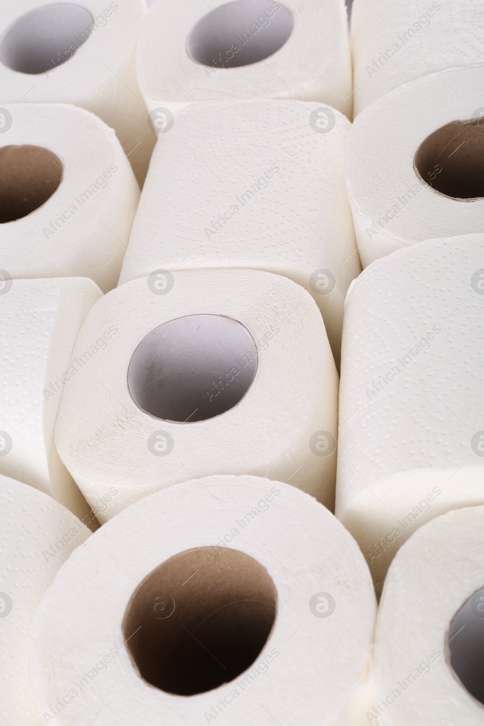 Photo of Many soft toilet paper rolls as background, above view