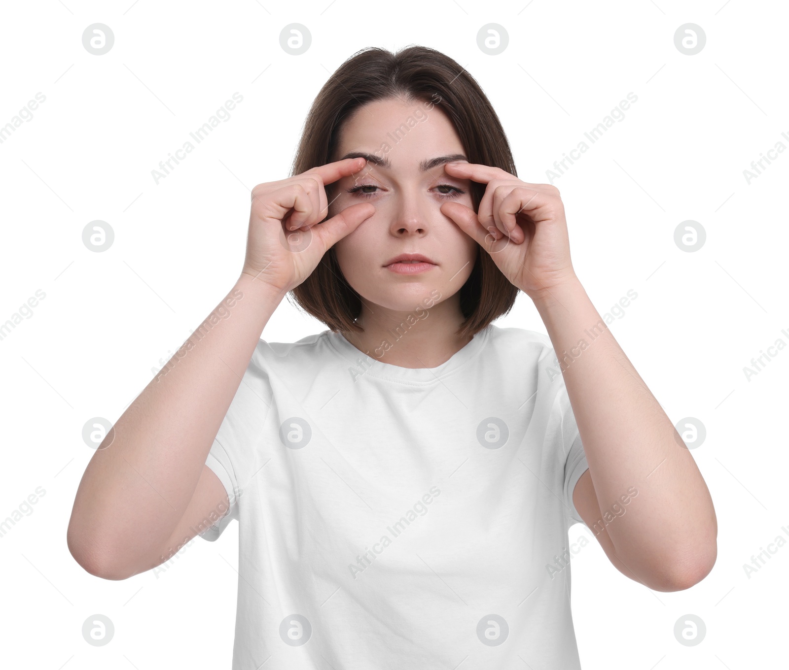 Photo of Sleepy young woman on white background. Insomnia problem