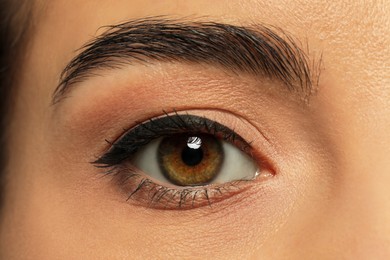 Young woman with permanent eyeliner makeup, closeup