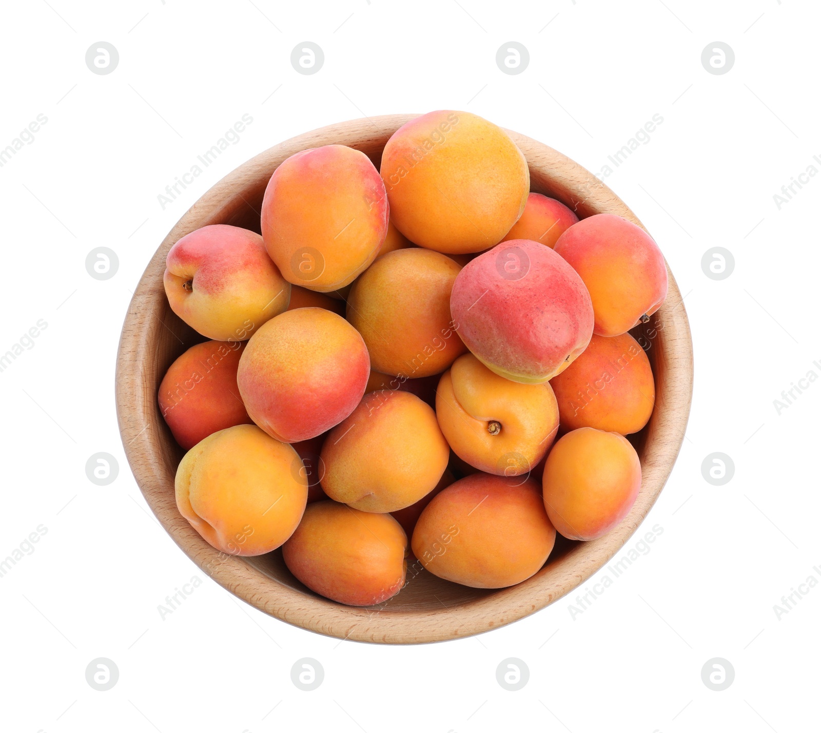 Photo of Delicious ripe apricots in wooden bowl isolated on white, top view