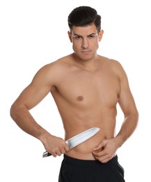 Photo of Fit man with knife on white background. Weight loss surgery