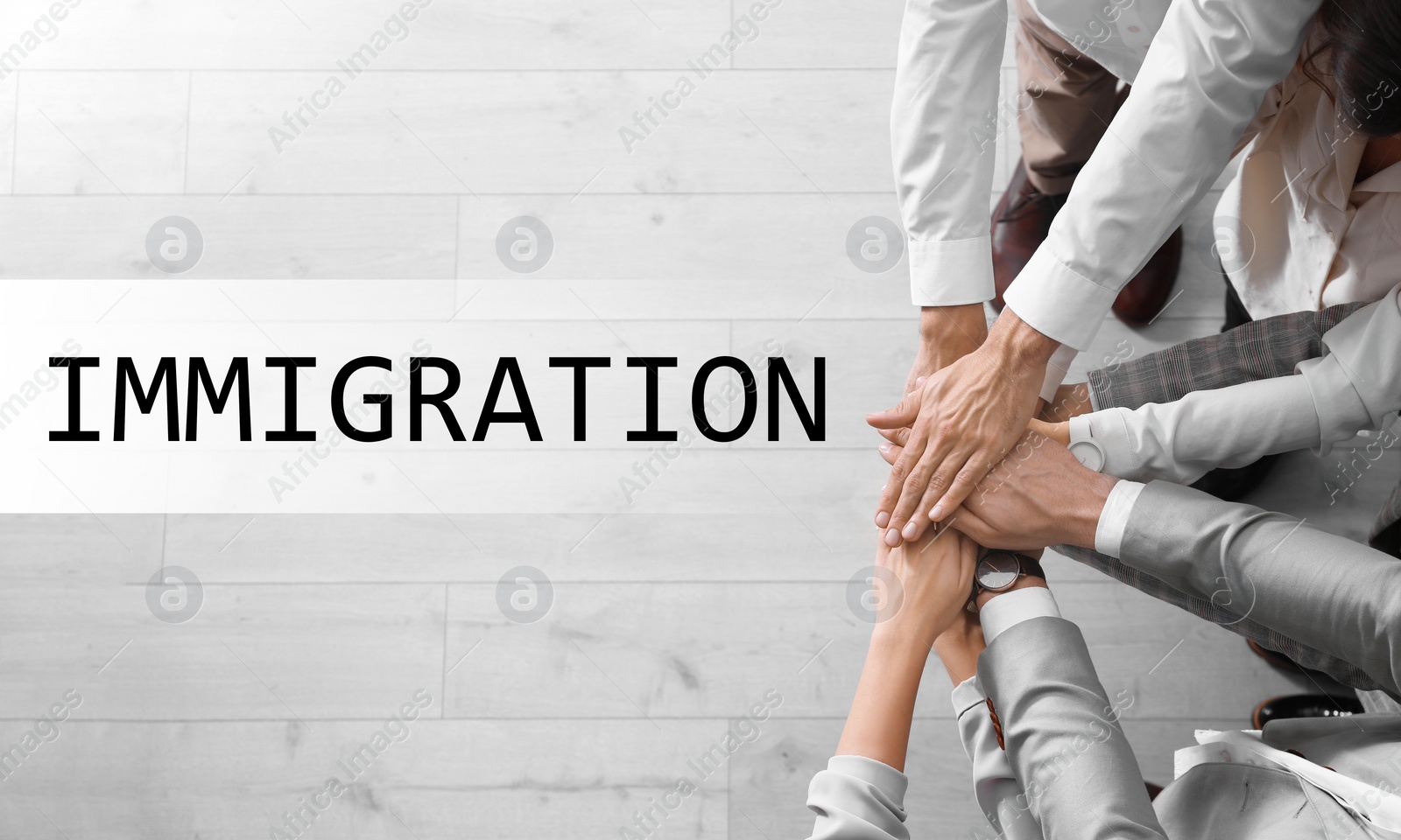 Image of Immigration concept. People holding hands together, top view