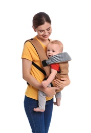 Woman with her son in baby carrier on white background