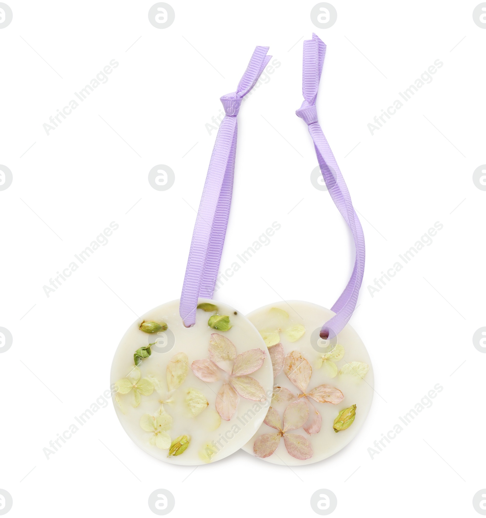 Photo of Beautiful scented sachets with flowers on white background, top view