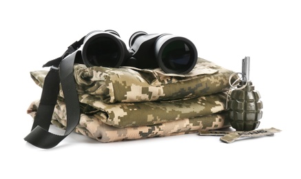 Military clothes, grenade and binocular on white background