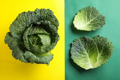 Photo of Fresh savoy cabbage on color background, flat lay