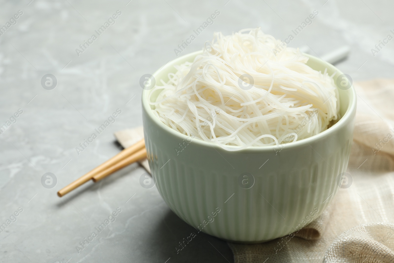 Photo of Rice noodles on light grey marble table