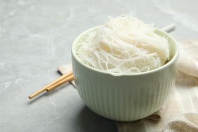 Photo of Rice noodles on light grey marble table