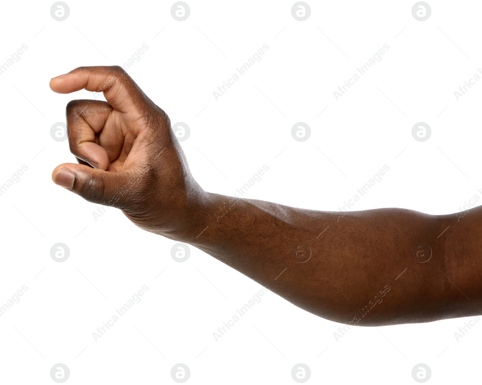 Photo of African-American man holding something in hand on white background, closeup