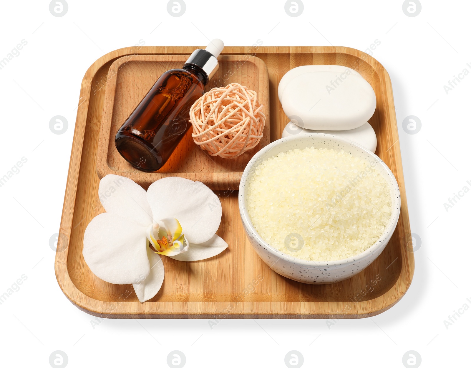 Photo of Sea salt in bowl, cosmetic product, spa stones and flower isolated on white