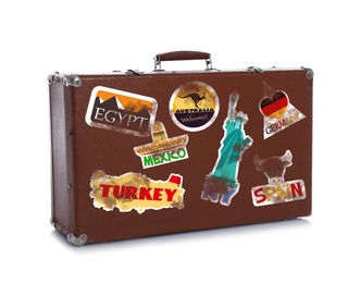 Image of Retro suitcase with travel stickers on white background