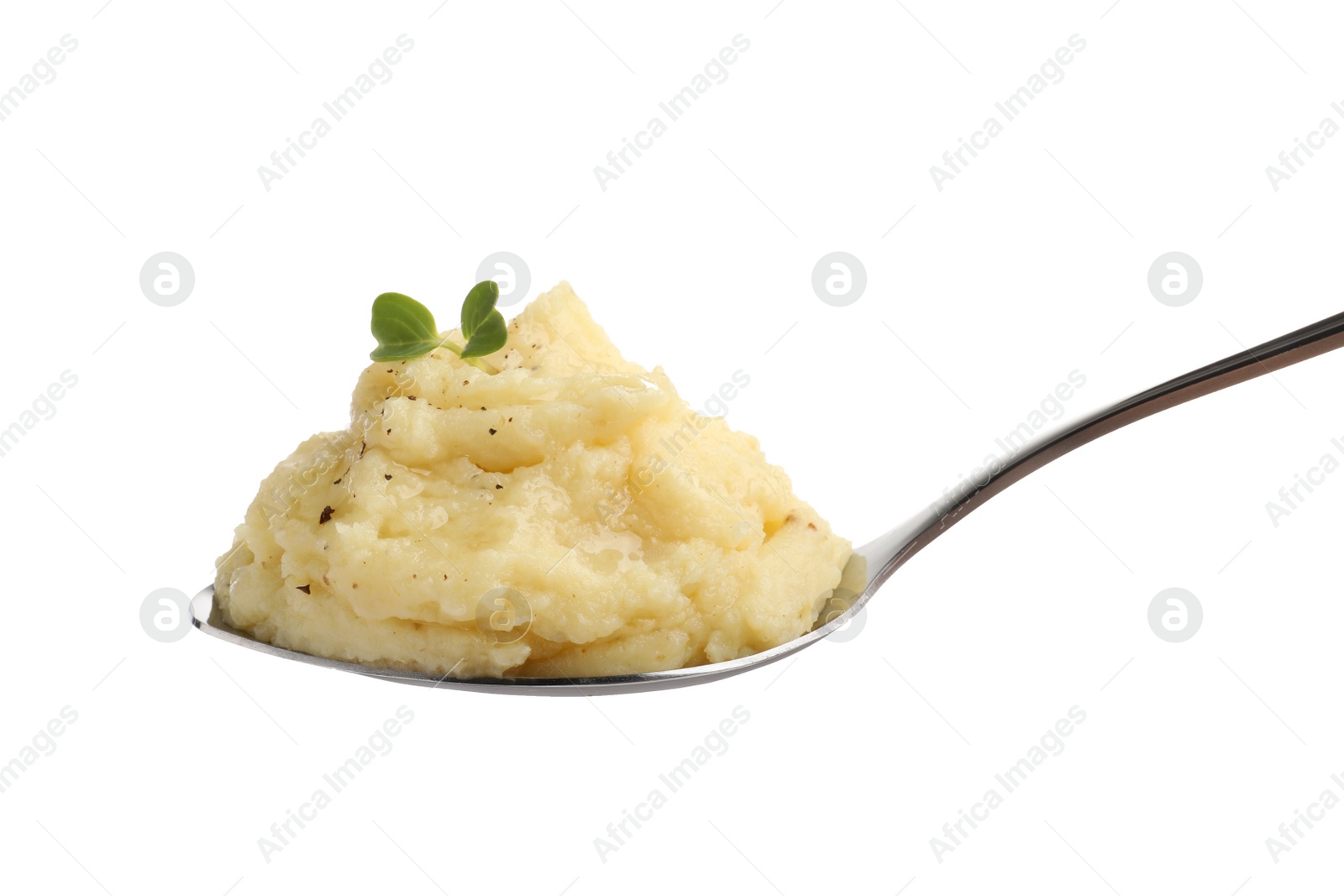 Photo of Spoon of tasty mashed potatoes with microgreen and black pepper isolated on white