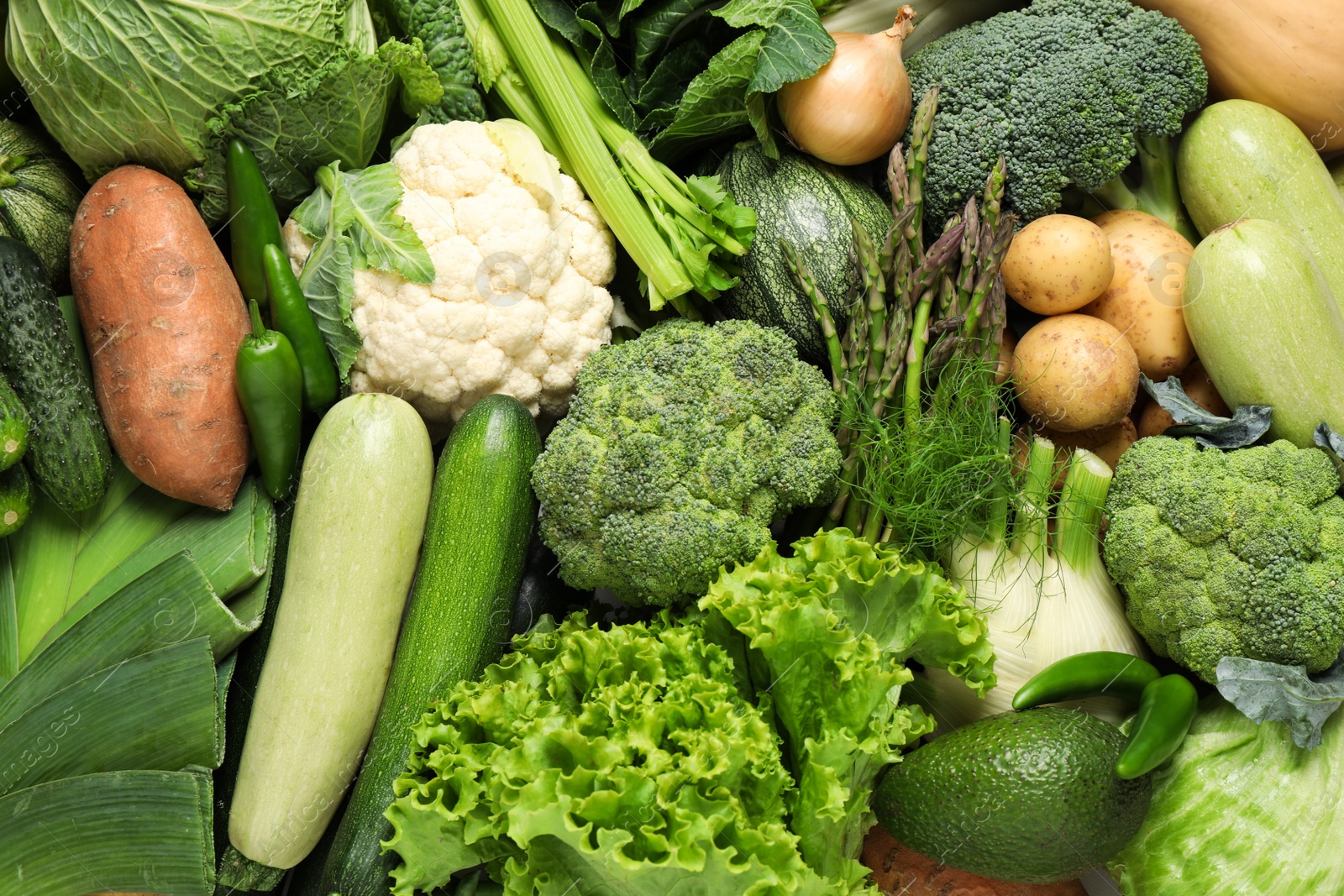 Photo of Different fresh vegetables as background, closeup view