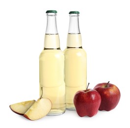 Photo of Delicious cider, whole and cut red apples isolated on white