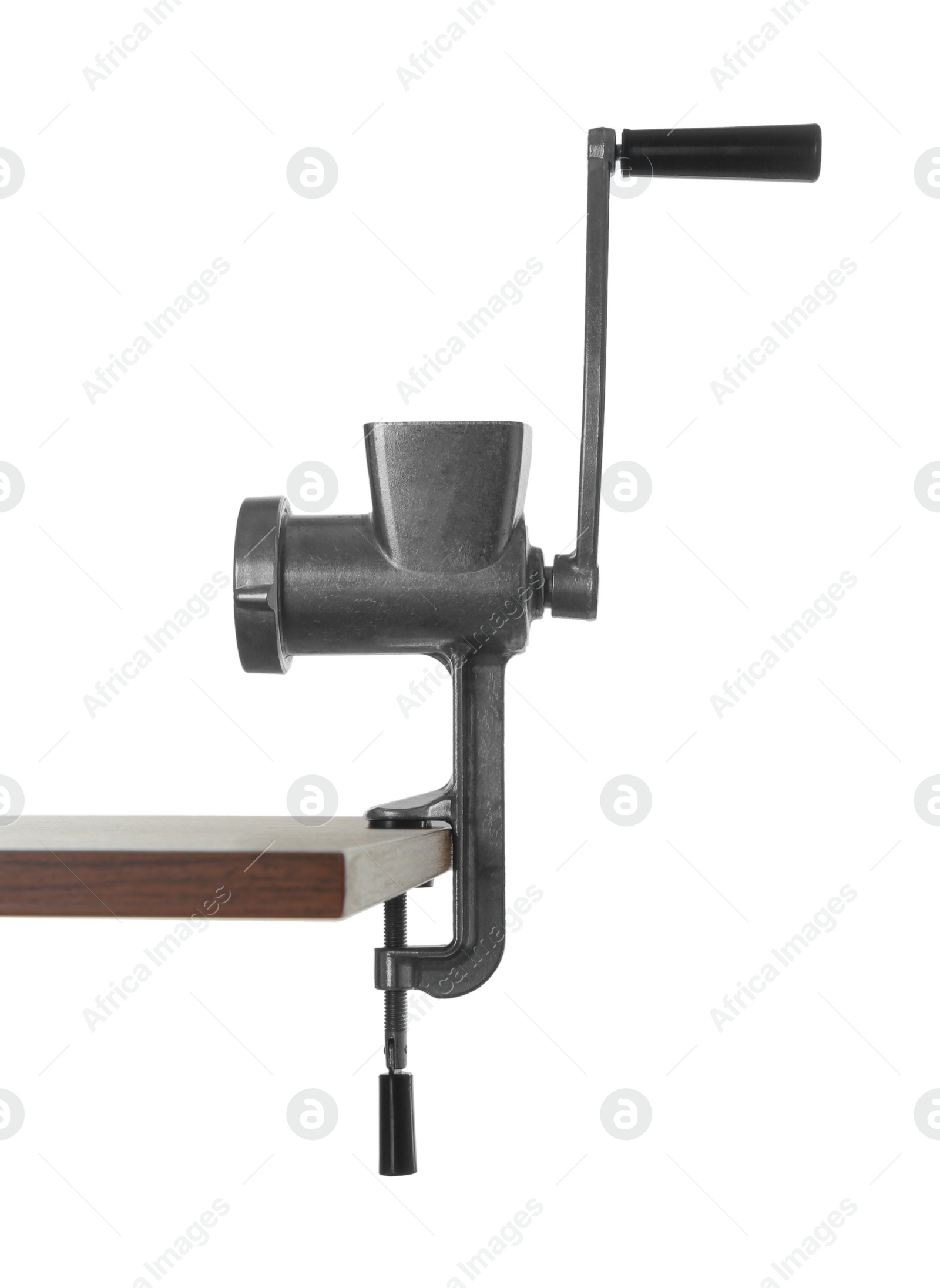 Photo of Metal manual meat grinder on table against white background