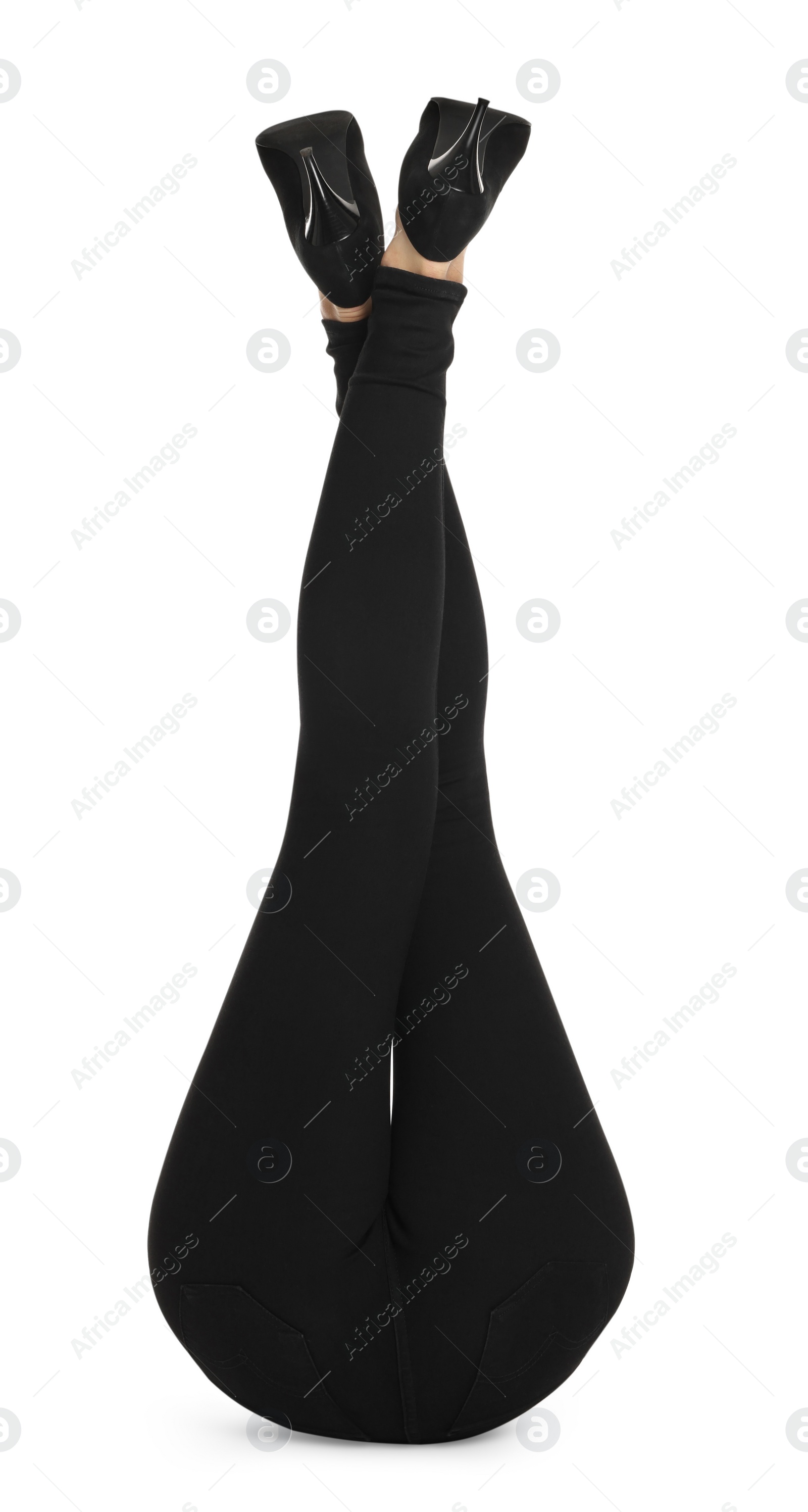 Photo of Woman wearing stylish black jeans and high heels shoes on white background, closeup