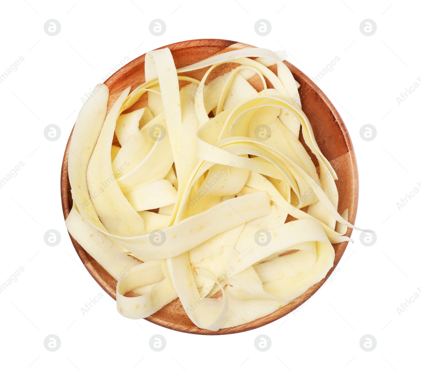 Photo of Plate with sliced fresh parsnip on white background, top view