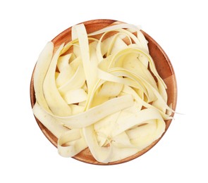 Plate with sliced fresh parsnip on white background, top view