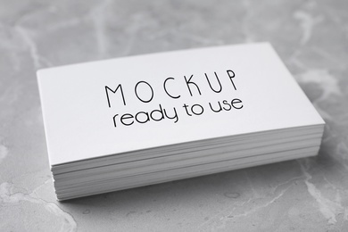 Stack of business cards with text Mockup Ready To Use on top