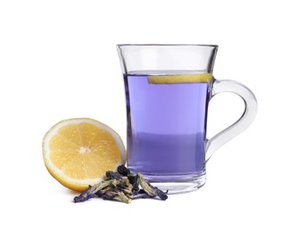 Photo of Glass cup of organic blue Anchan with lemon on white background. Herbal tea
