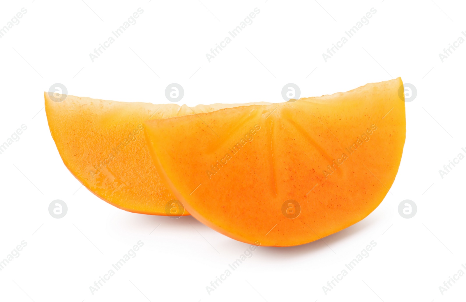 Photo of Slices of delicious ripe juicy persimmon on white background