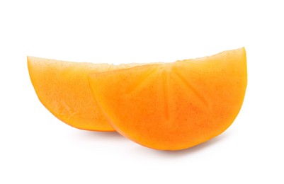 Photo of Slices of delicious ripe juicy persimmon on white background