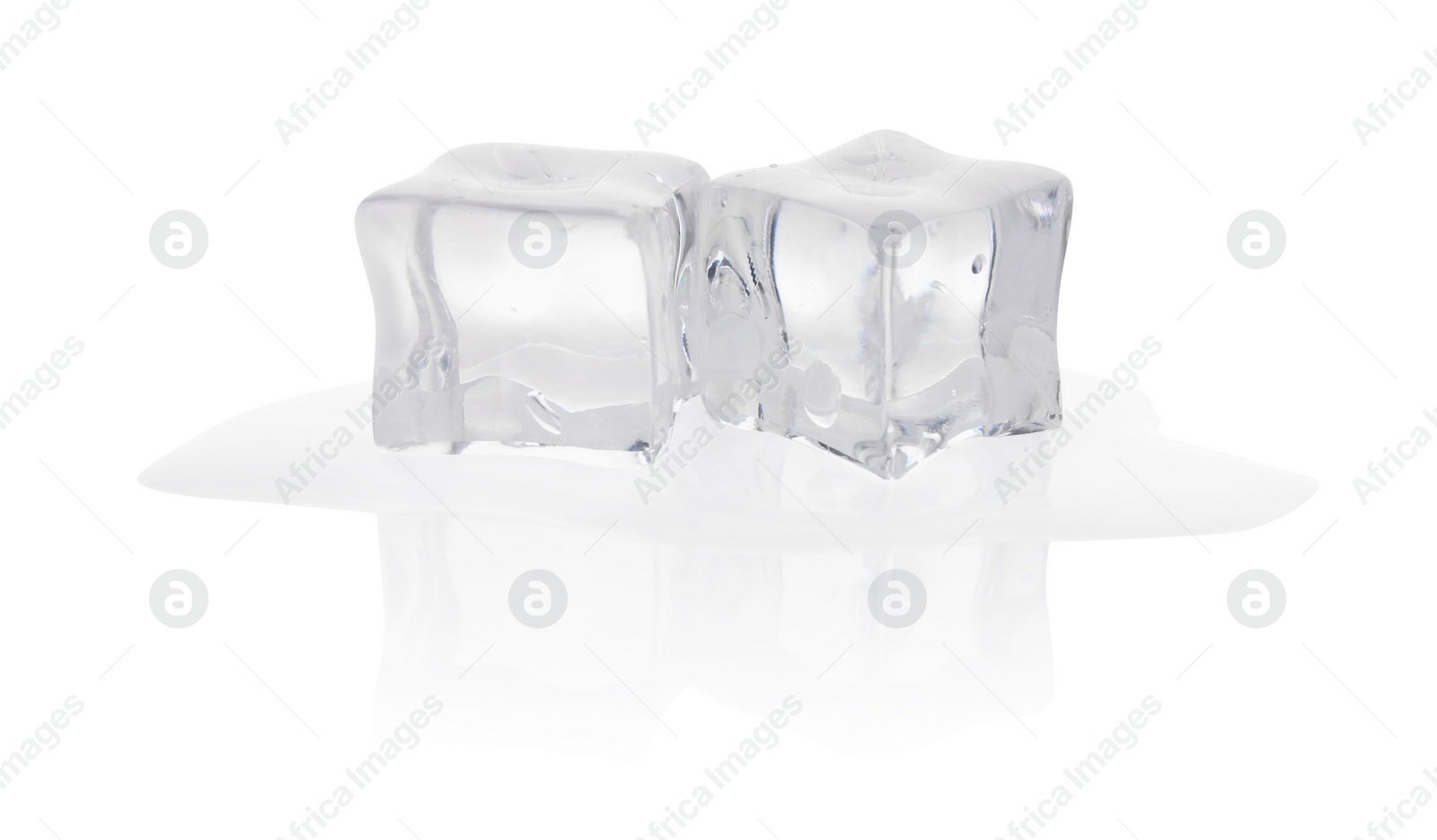 Photo of Melting crystal clear ice cubes isolated on white
