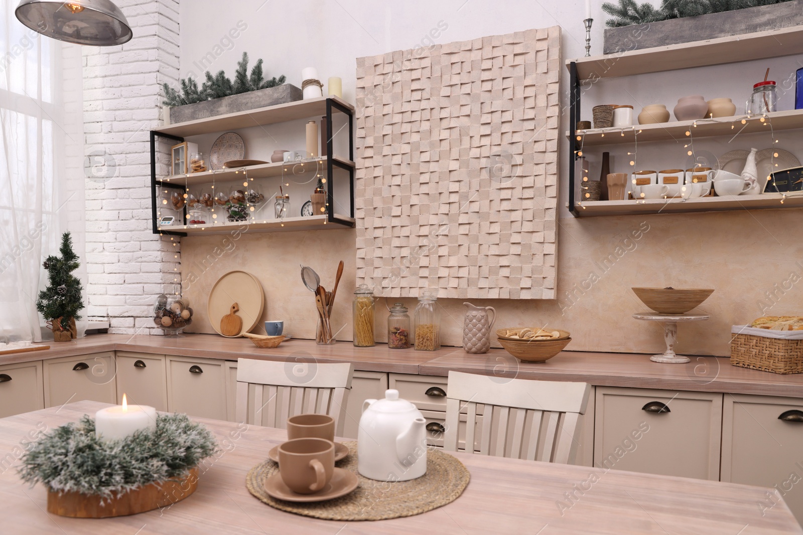 Photo of Kitchen interior with festive decor. Christmas celebration