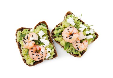 Photo of Delicious sandwiches with guacamole, shrimps and black sesame seeds on white background, top view