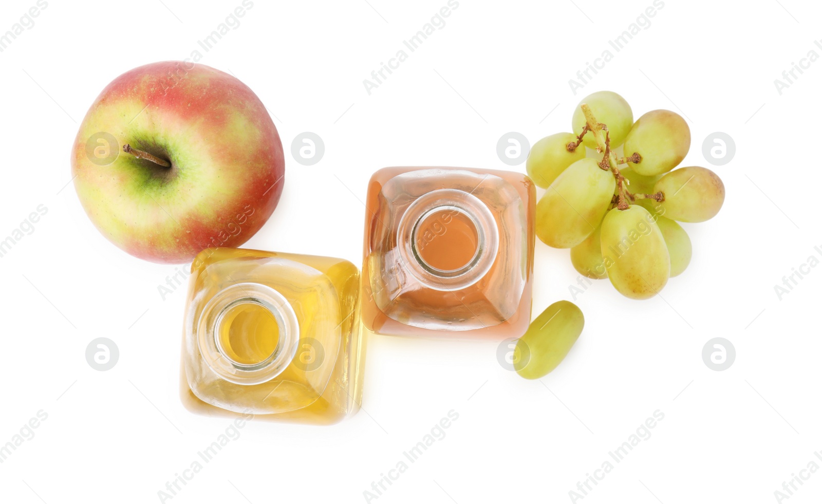 Photo of Different types of vinegar and ingredients isolated on white, top view