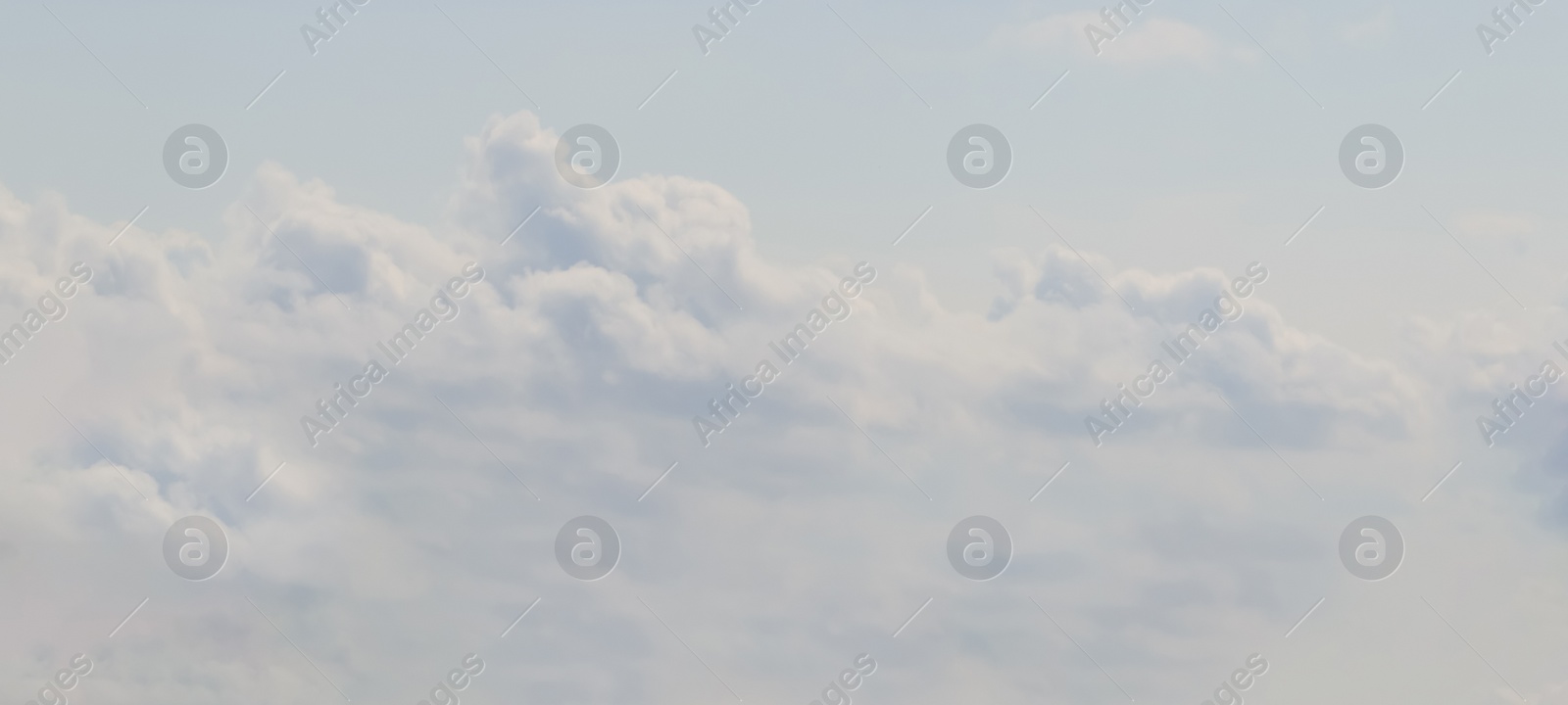 Image of Beautiful sky with fluffy white clouds, banner design