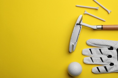 Set of golf equipment on color background, flat lay. Space for text