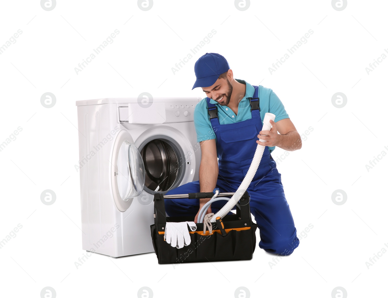 Photo of Repairman with toolbox near washing machine on white background