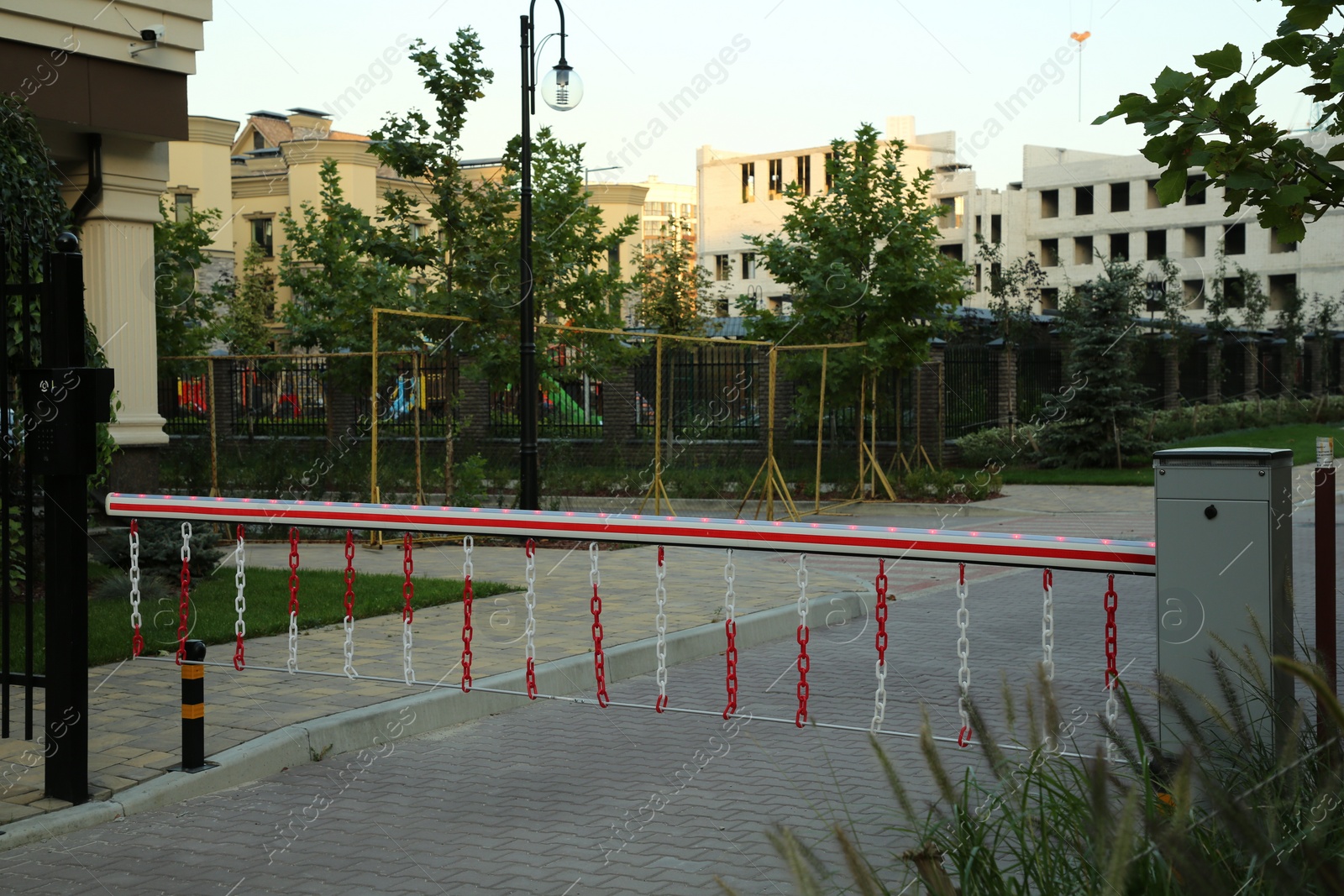 Photo of Closed automatic boom barrier on city street