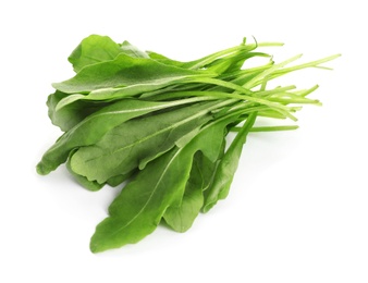 Fresh green arugula leaves on white background