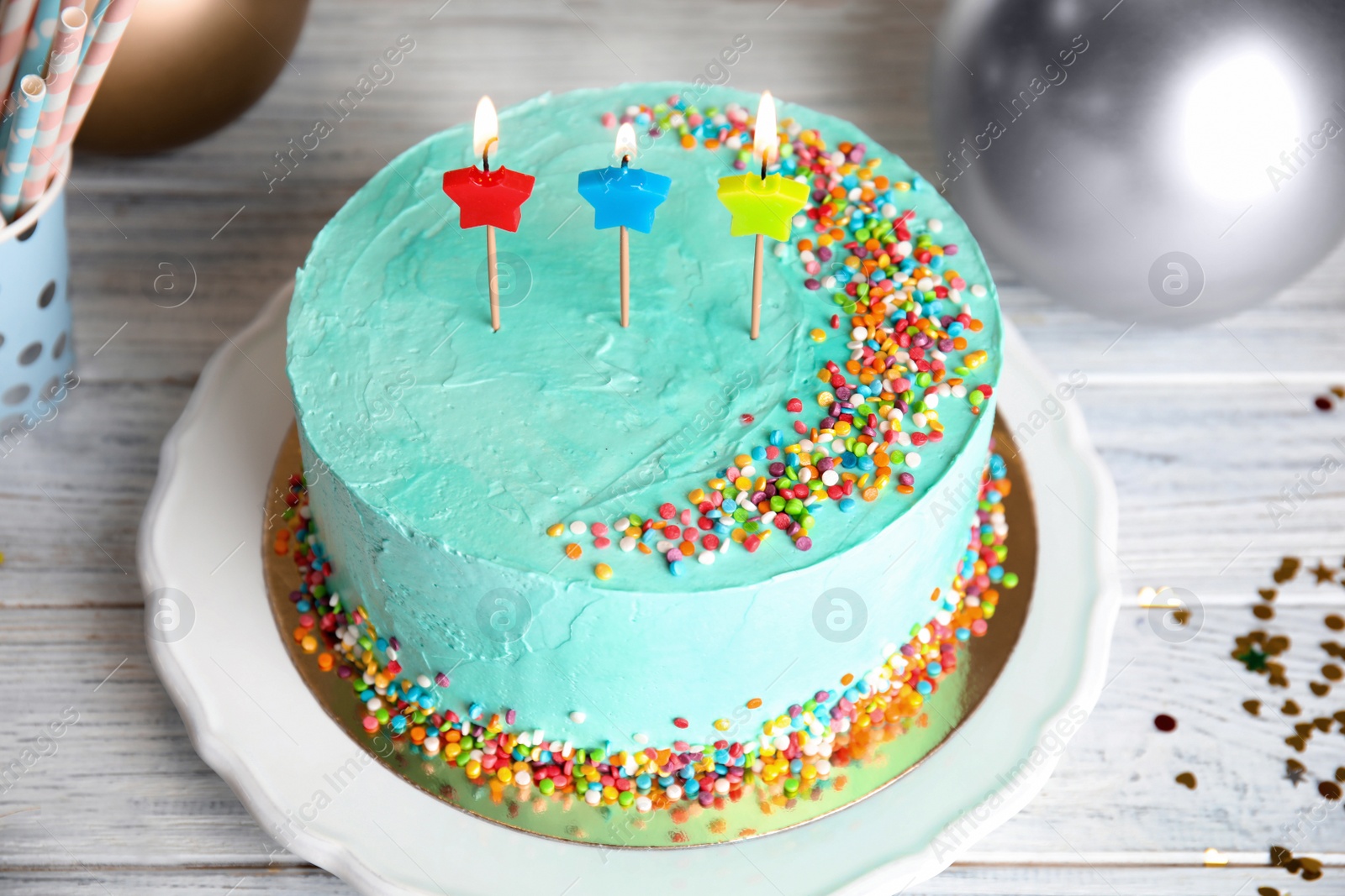 Photo of Fresh delicious birthday cake with candles on wooden table