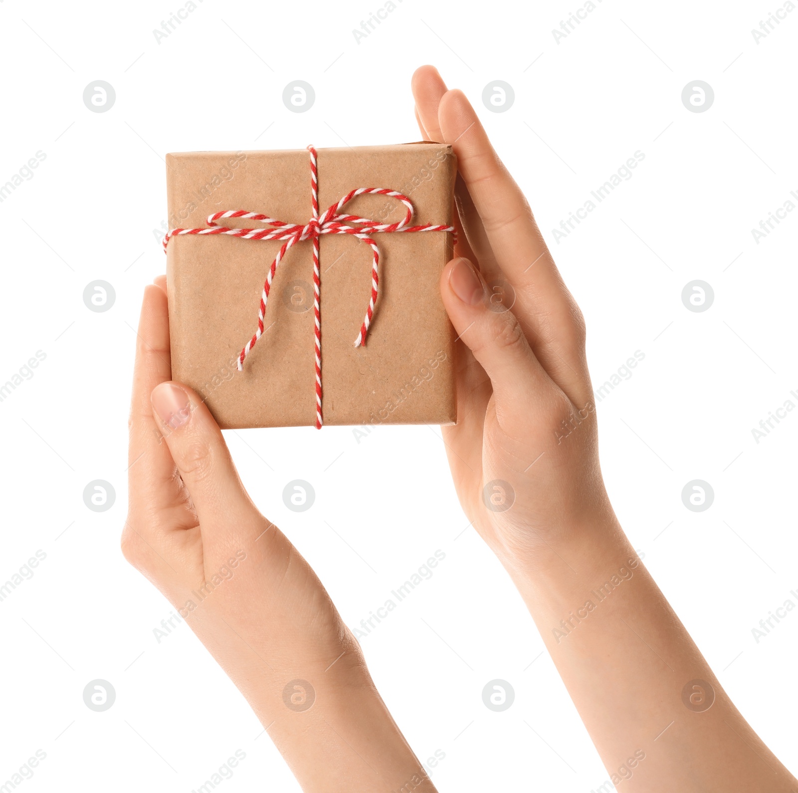 Photo of Woman holding parcel wrapped in kraft paper on white background, closeup