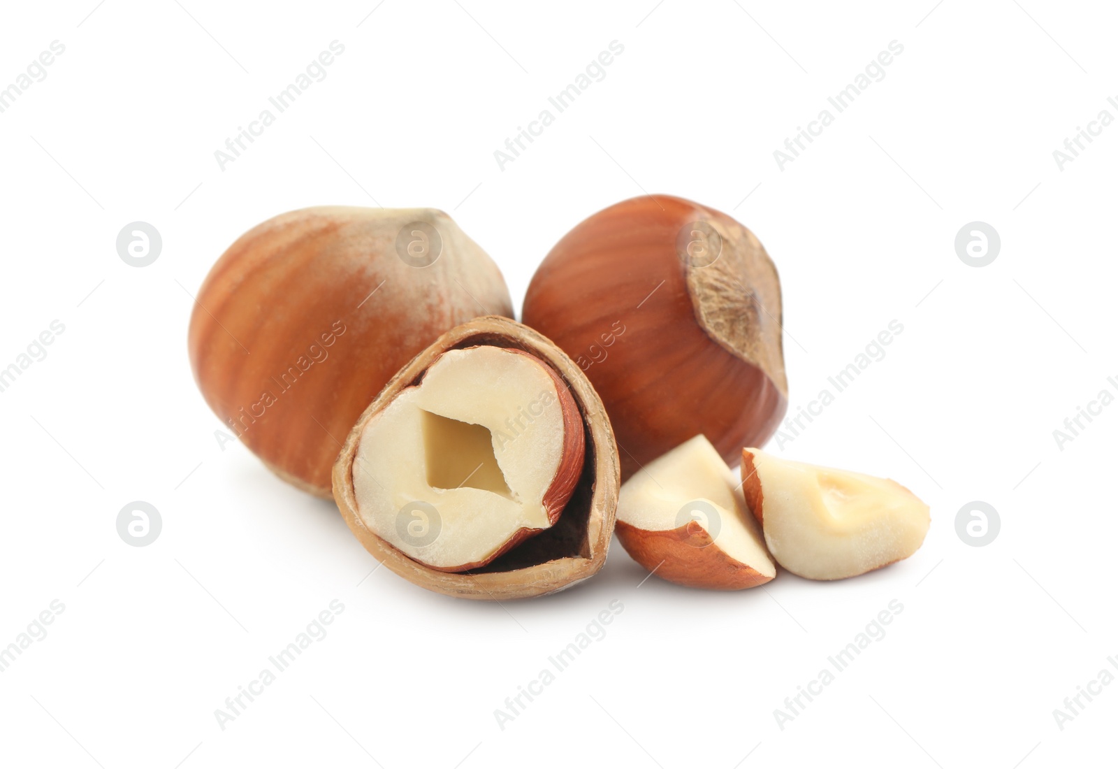 Photo of Tasty organic hazelnuts on white background. Healthy snack