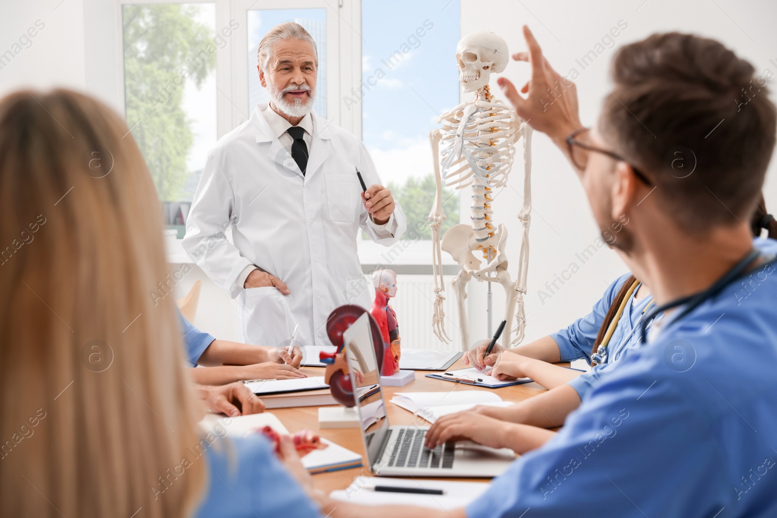 Photo of Doctor giving lecture for interns in university