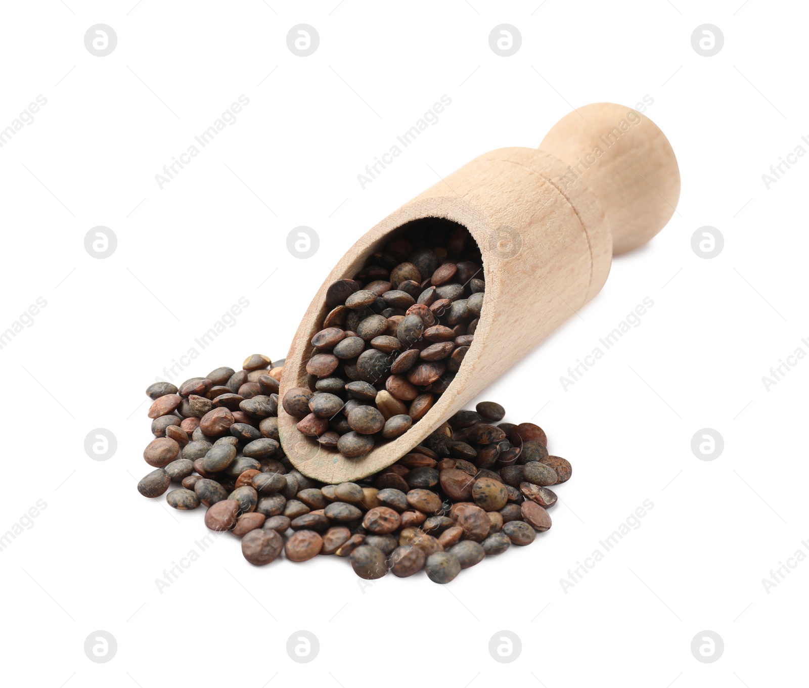 Photo of Wooden scoop with raw lentils isolated on white